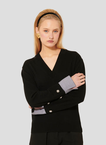 Luxurious Merino Wool Top in Black with Striped Cuffs and Jewel Button Detail.