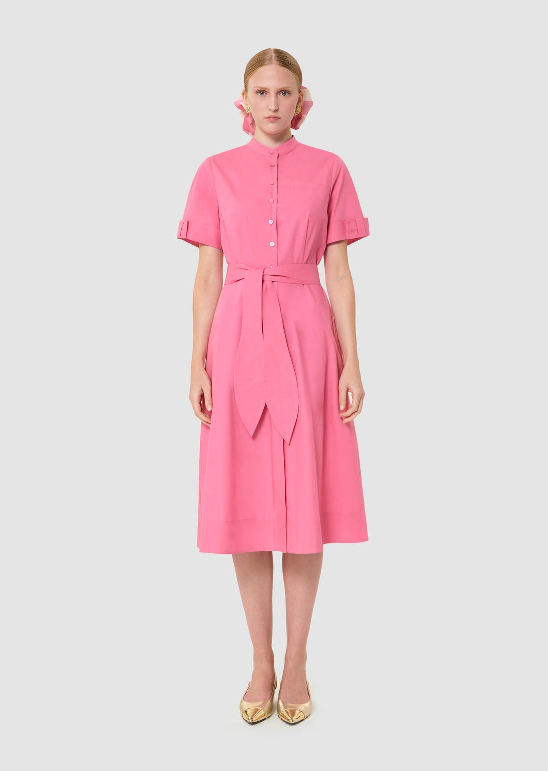 Model wearing Ricochet pink poplin dress from Tara Jarmon Lebanon