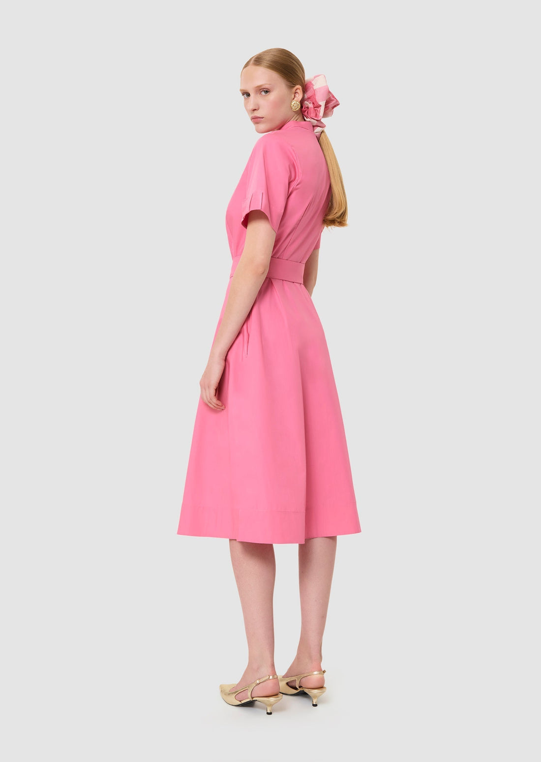 Model wearing Ricochet pink poplin dress from Tara Jarmon Lebanon