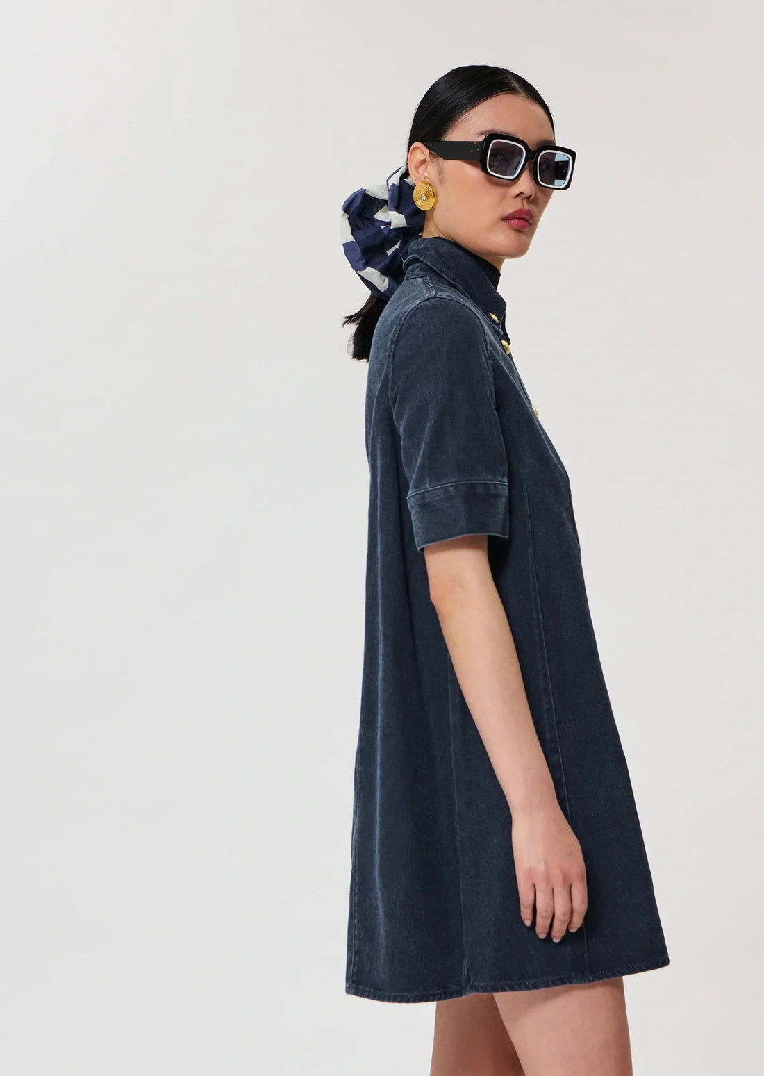 Women wearing Riva dark blue cotton dress by Tara Jarmon Lebanon