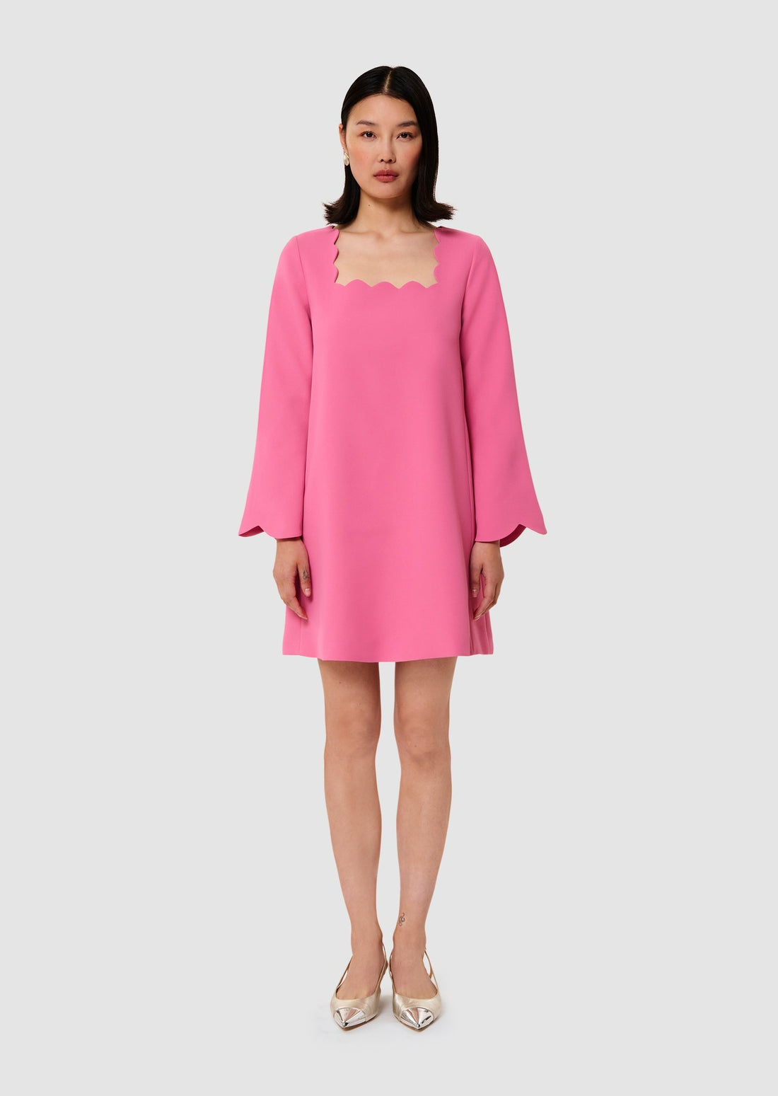 Model wearing Rossie pink crepe dress from Tara Jarmon Lebanon 