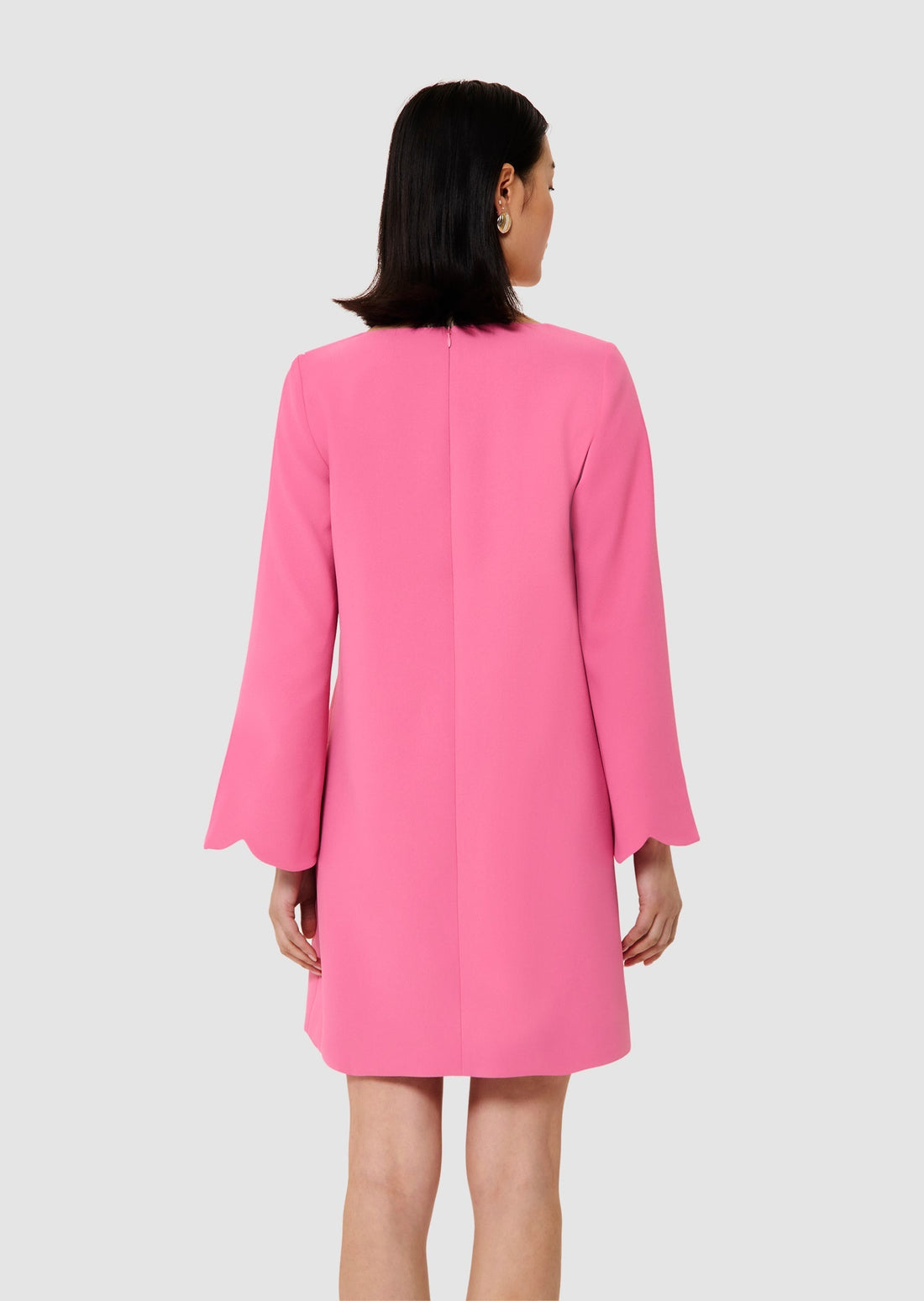 Model wearing Rossie pink crepe dress from Tara Jarmon Lebanon 