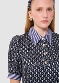 Woman wearing a Tilly midnight blue floral print top Tara Jarmon
