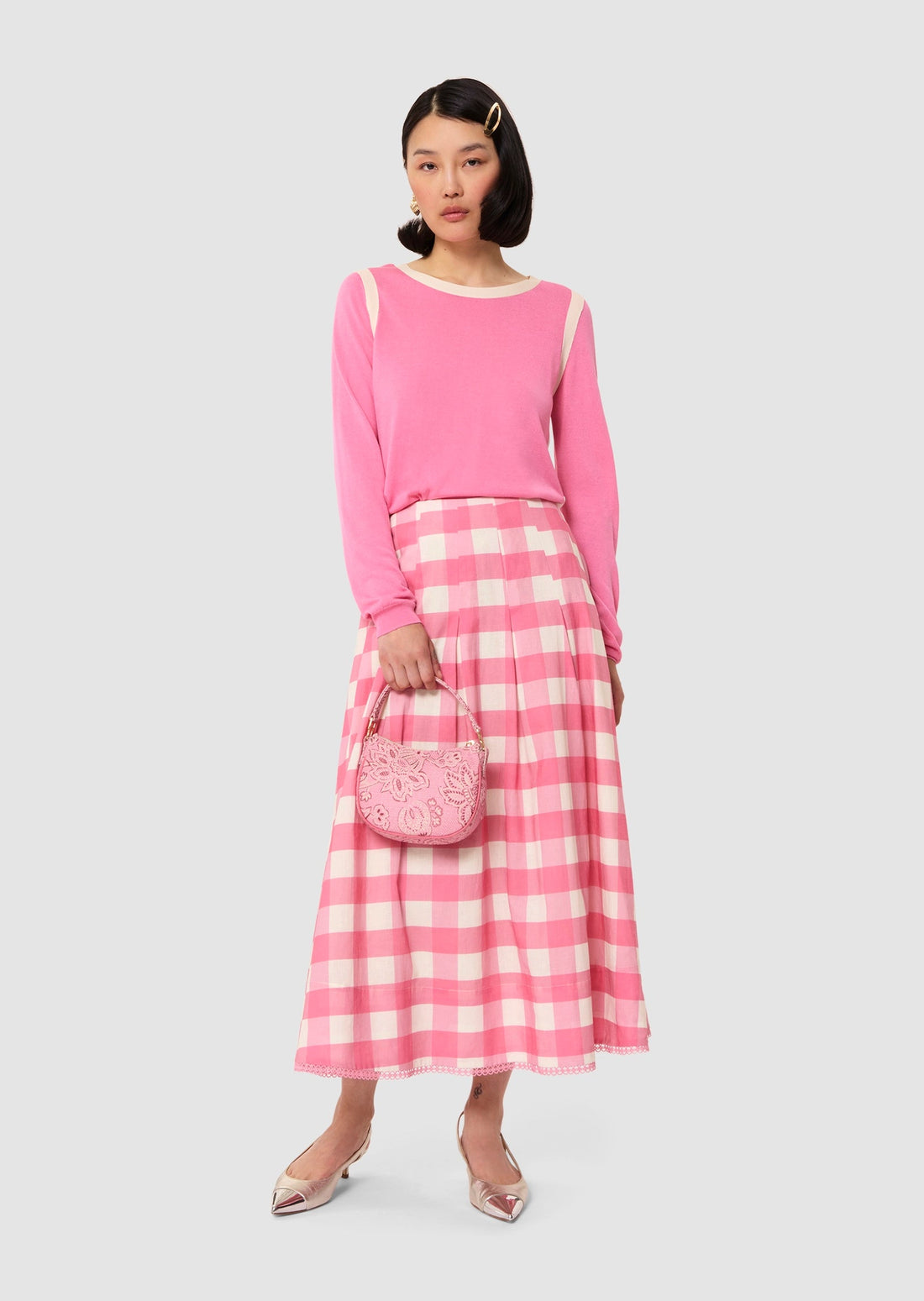 Model wearing pink cotton top from Tara Jarmon Lebanon