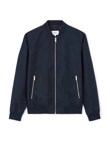 Navy bomber jacket with zippers on a white background