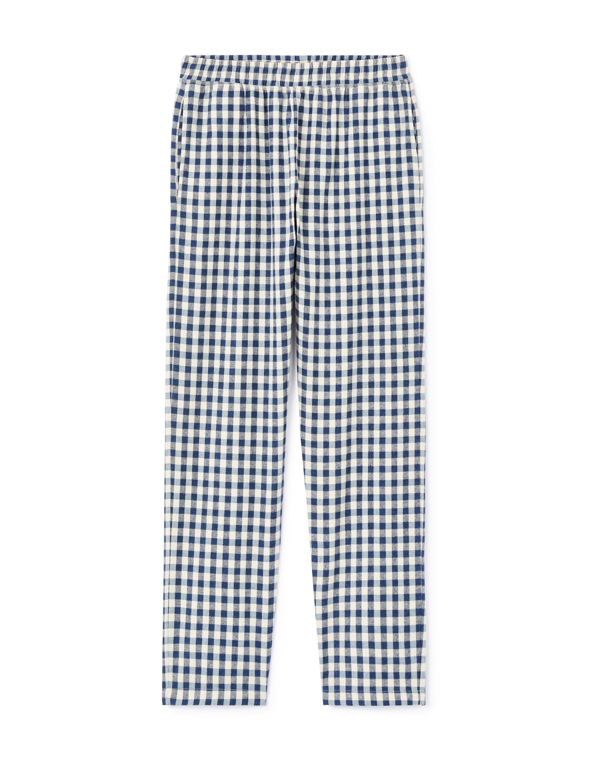 A beige pyjama top and blue checkered pants set for adults.
