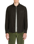 A black long sleeve denim shirt with a collar and front pocket.