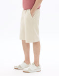 Loose twill-effect knit Bermuda shorts Celio