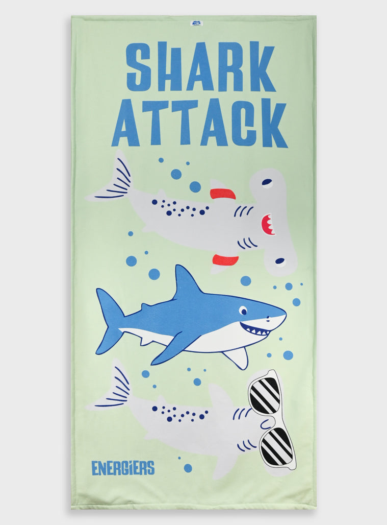 Children's towel with shark design and 'Shark Attack' text on a light green background
