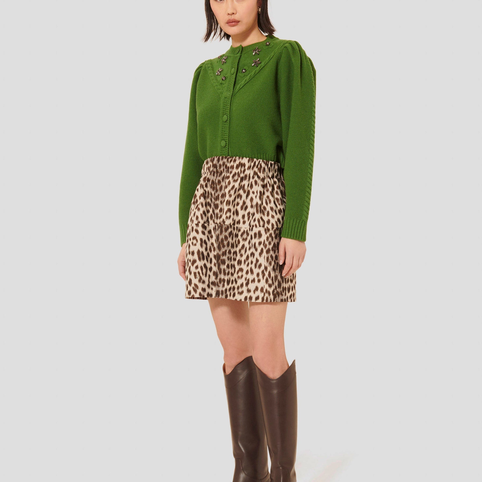 Tara Jarmon model wearing leopard short skirt