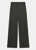 Black pants with white polka dots. 
