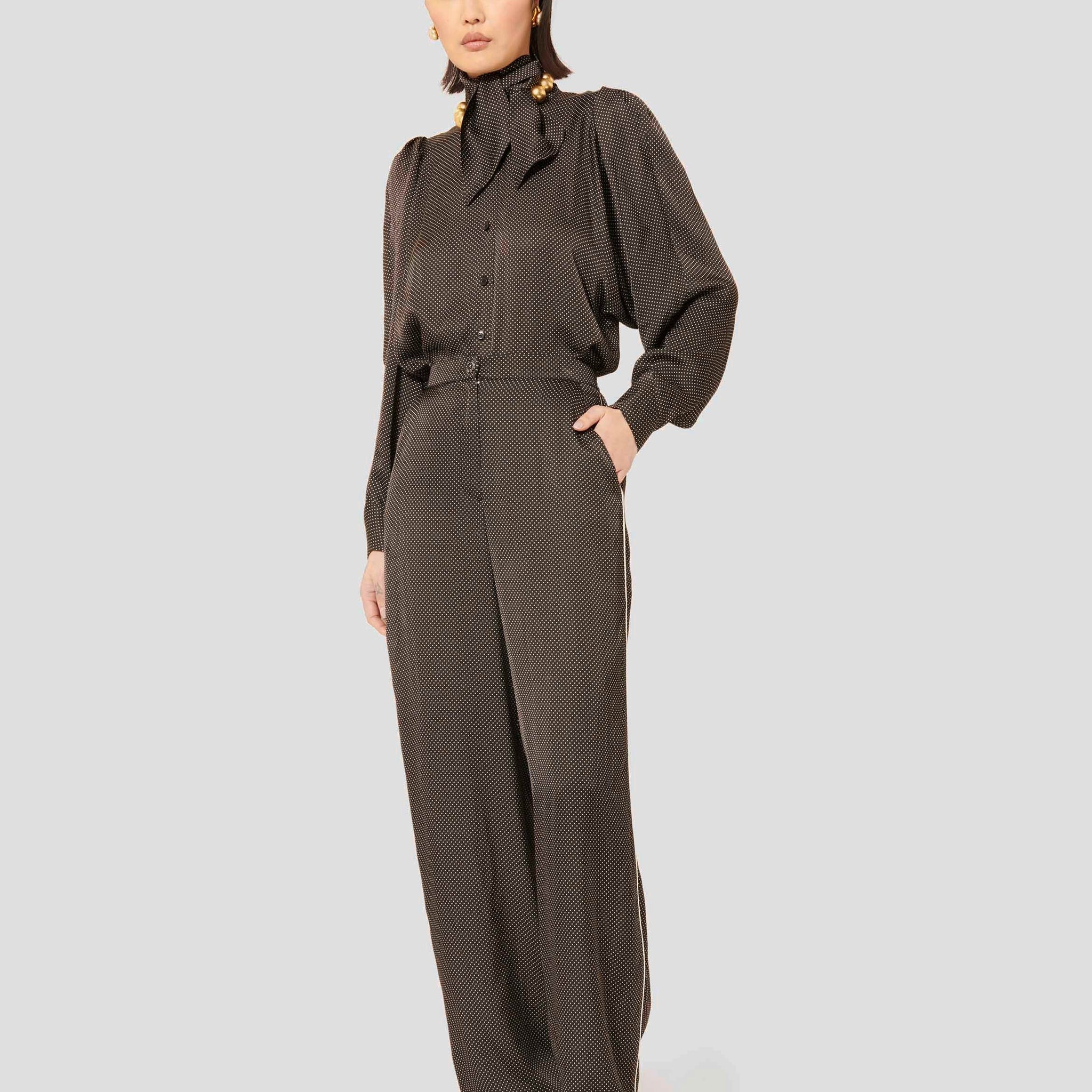 Black and White Polka Dot Pants with Side Pockets and Zip Closure.