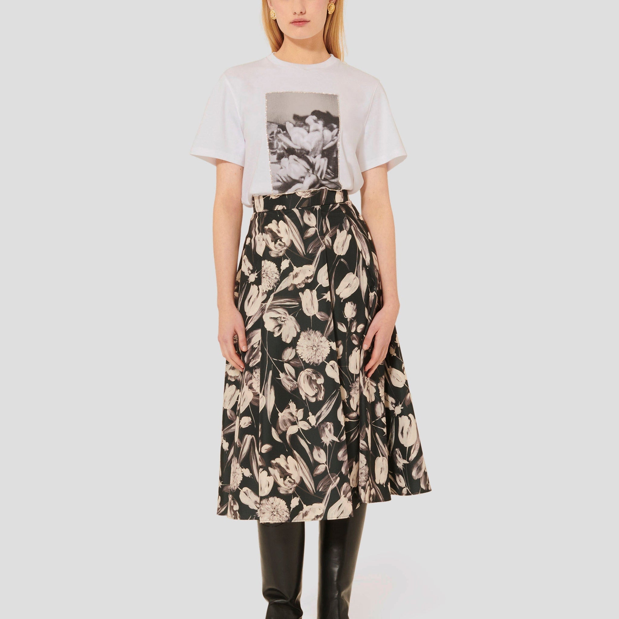 Model wearing Tara Jarmon White Cotton T-Shirt with Floral Print and Rhinestones.