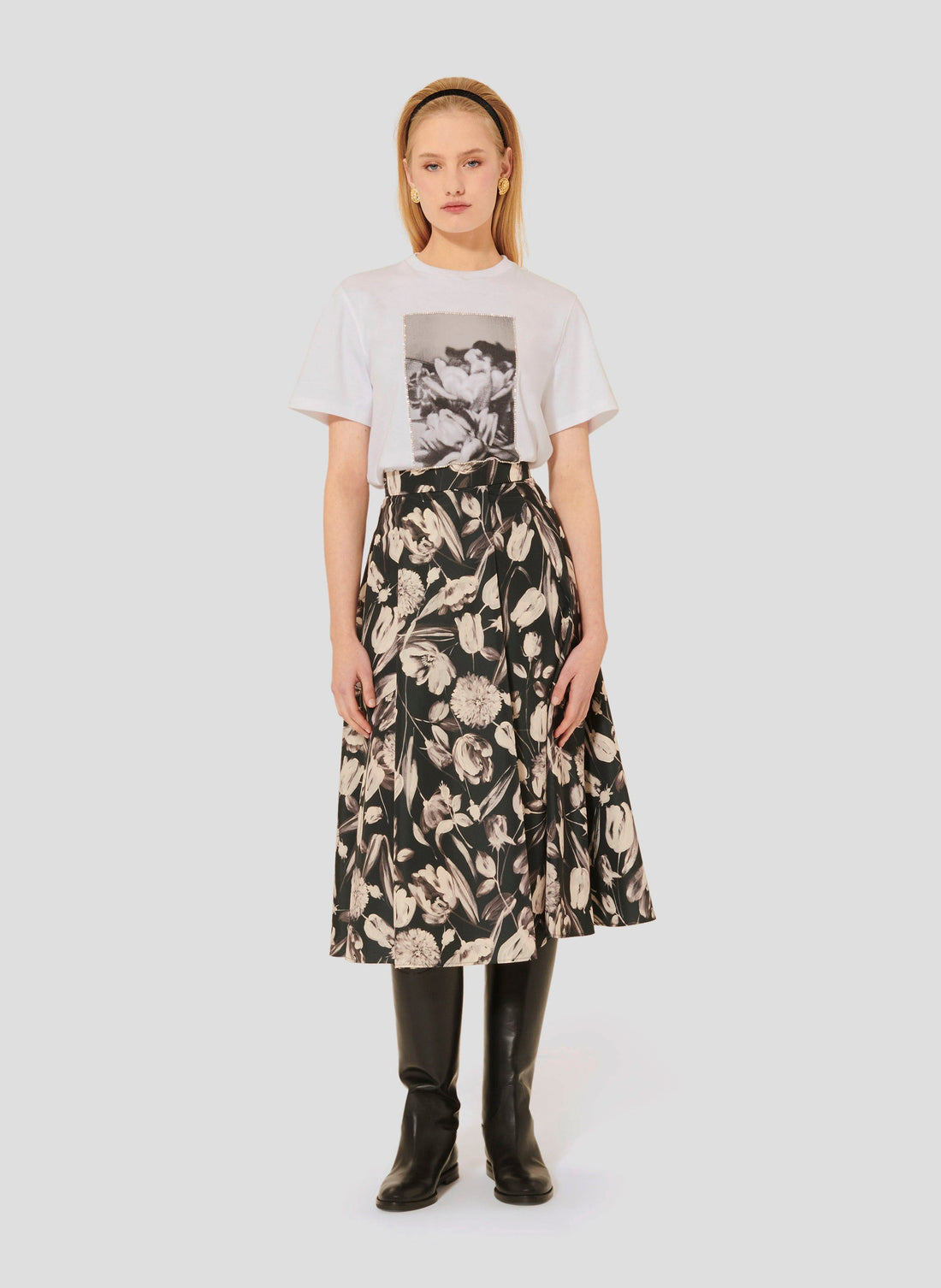 Model wearing Tara Jarmon White Cotton T-Shirt with Floral Print and Rhinestones.