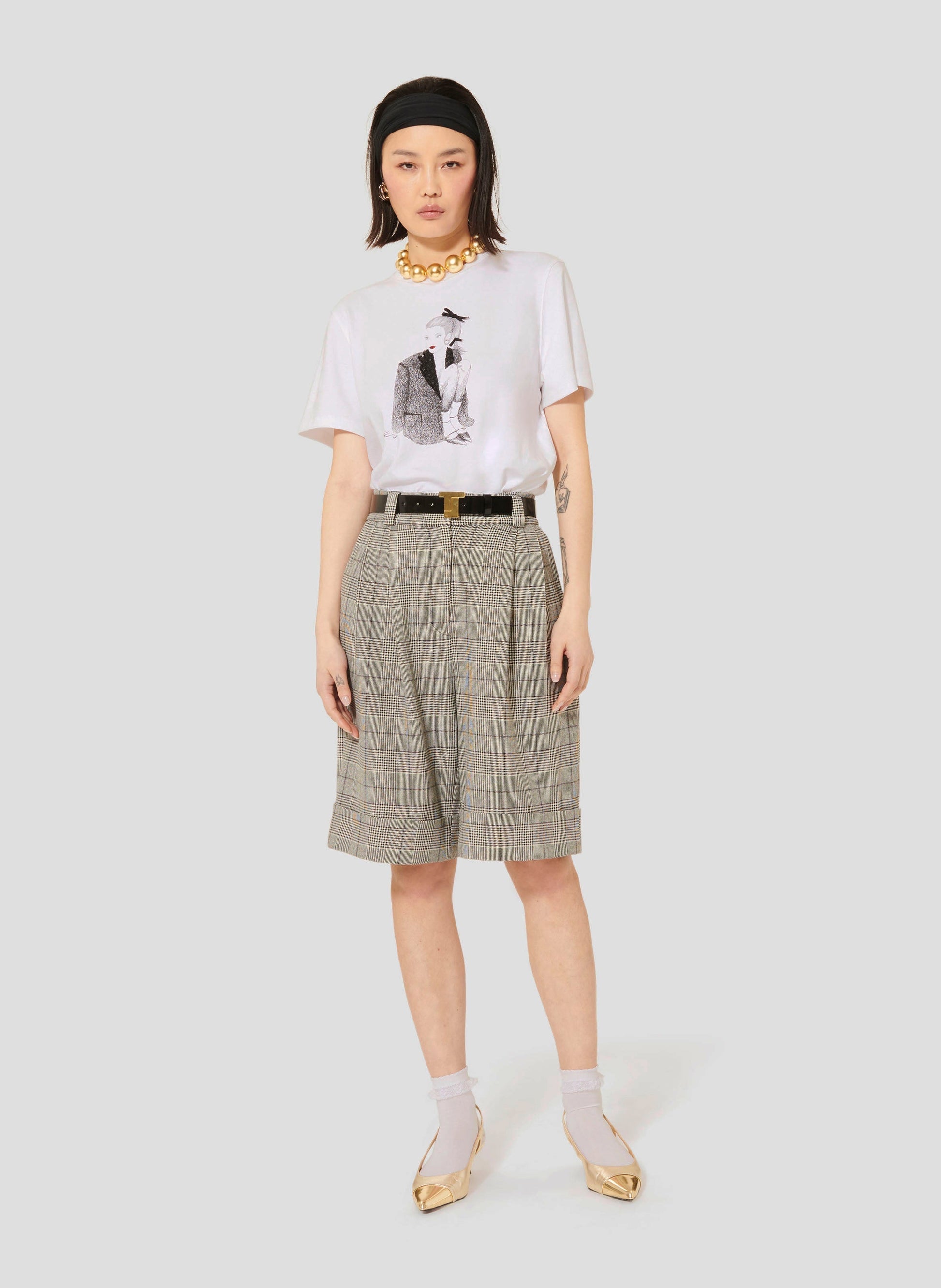 Casual short sleeves white t-shirt with straight cut and round neckline.