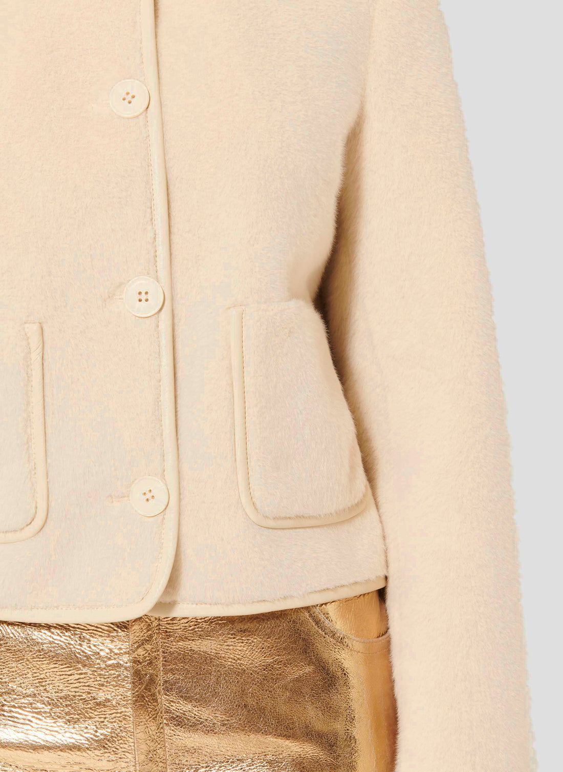 Cream Faux Fur Jacket with Round Neckline and Button Closure.