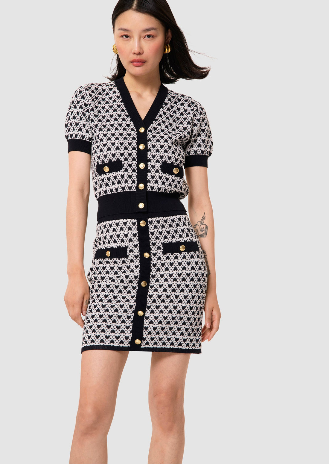 Jani ecru cotton skirt with mini heart print