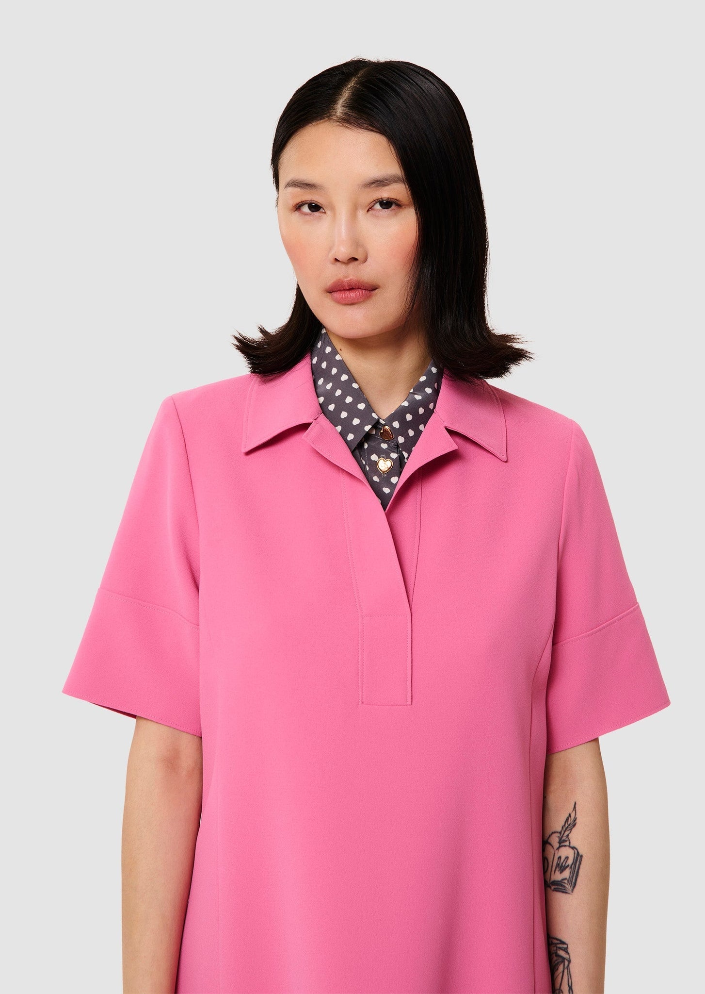 Model wearing Robby pink crepe dress from Tara Jarmon Lebanon