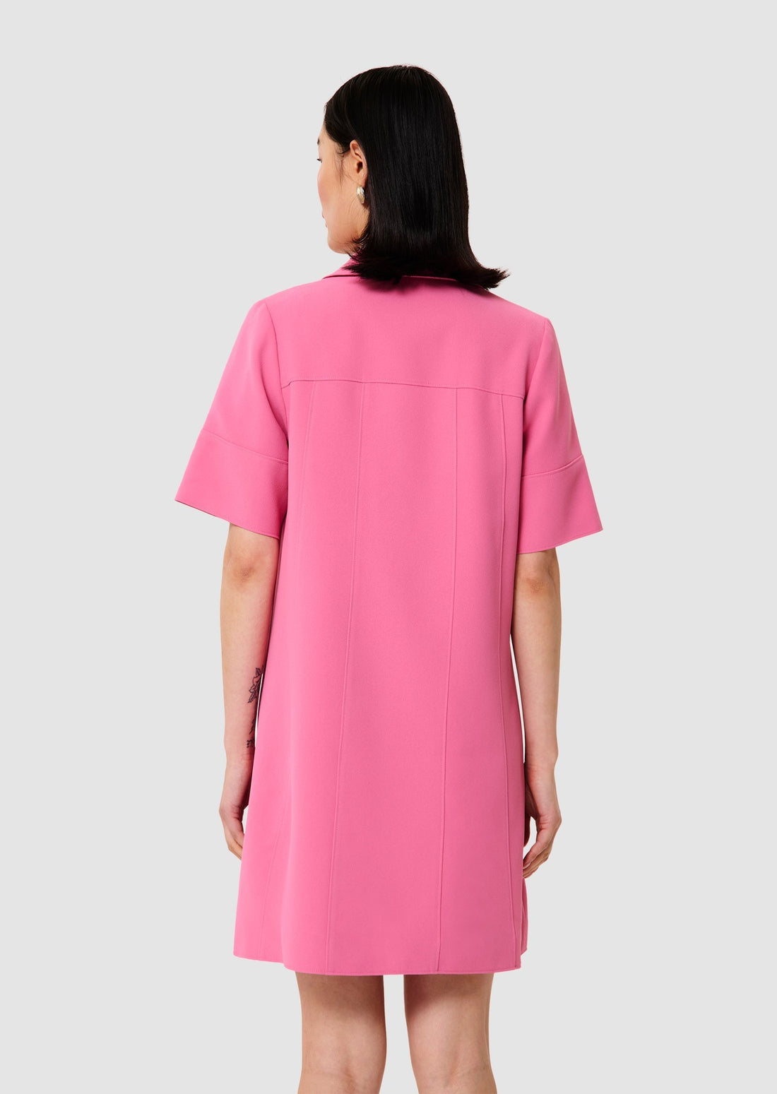 Model wearing Robby pink crepe dress from Tara Jarmon Lebanon