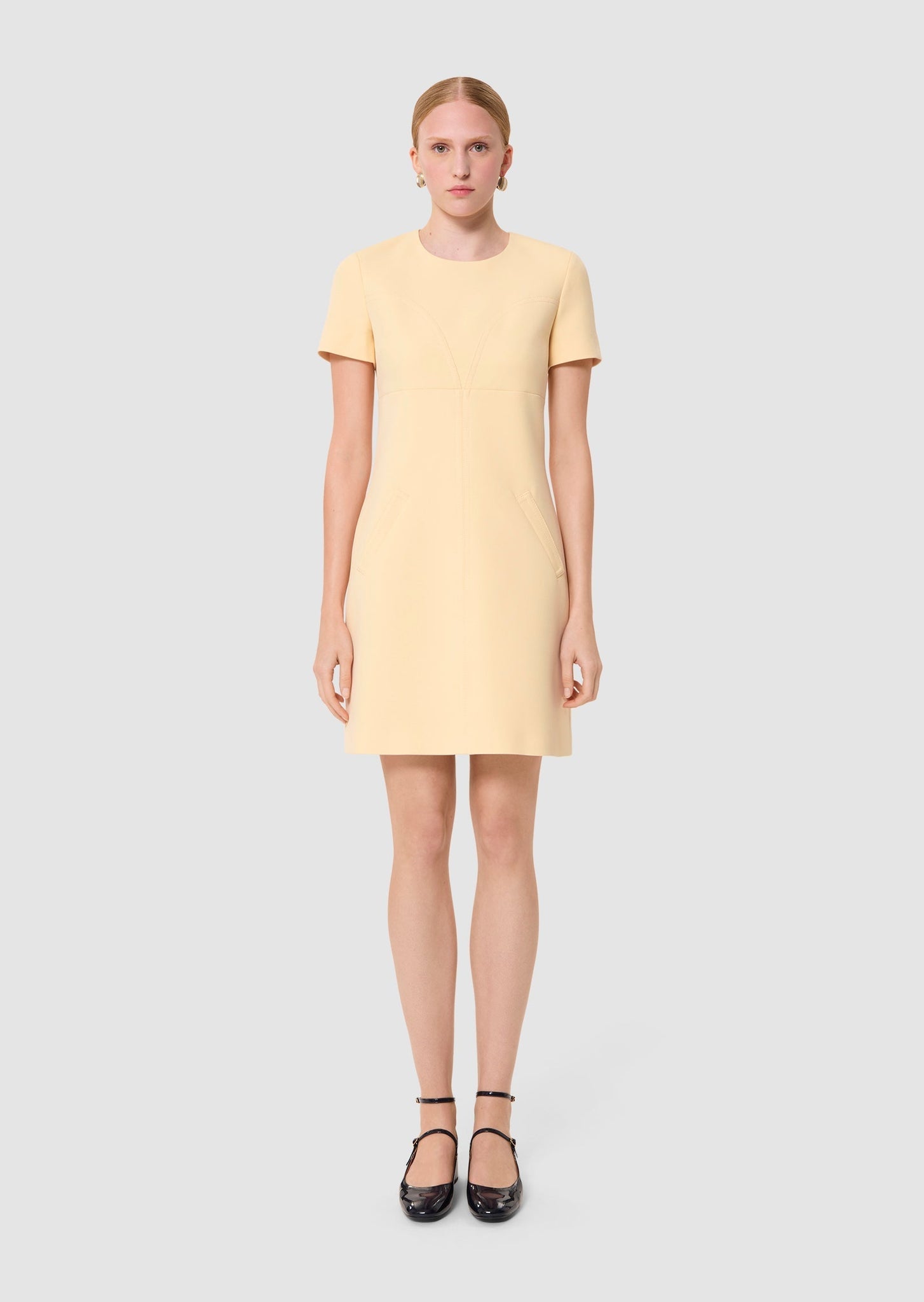 Model wearing Rehane Vanilla Dress by Tara Jarmon Lebanon