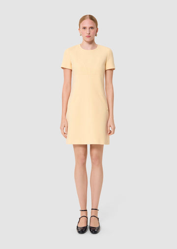 Model wearing Rehane Vanilla Dress by Tara Jarmon Lebanon