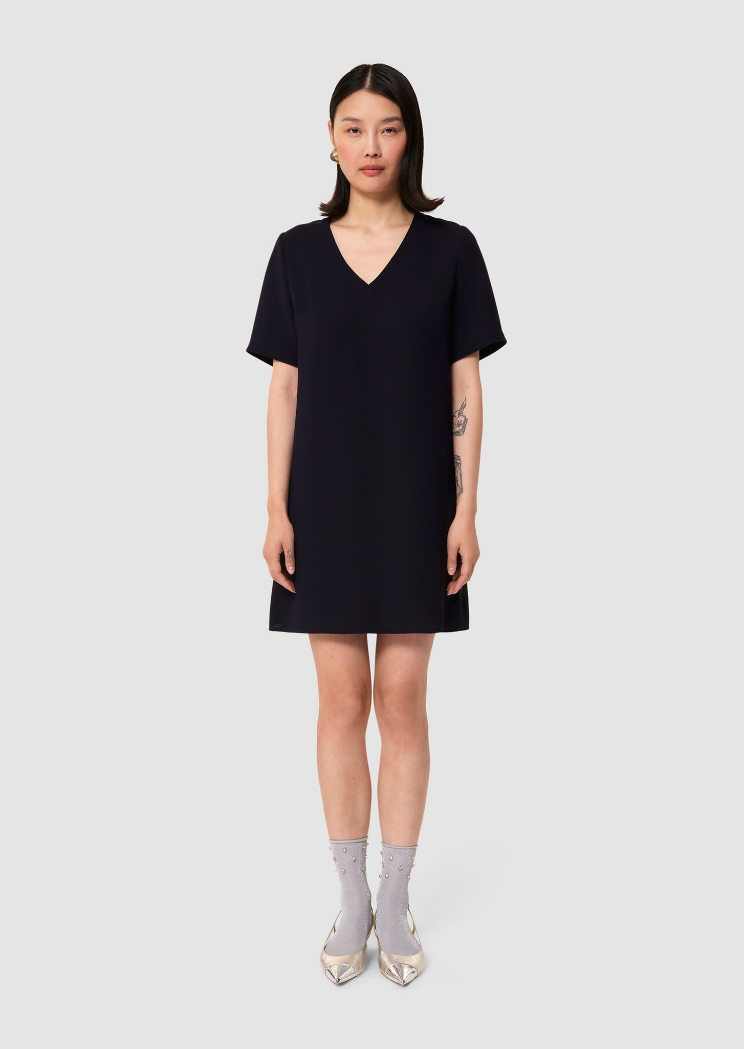 model wearing Ruban Navy Dress by Tara Jarmon Lebanon