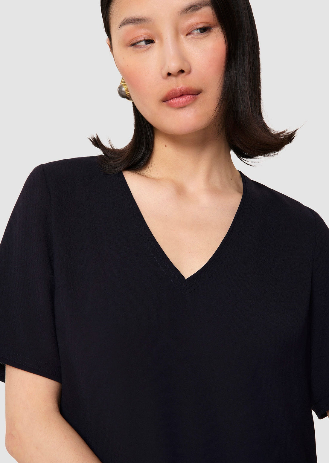 model wearing Ruban Navy Dress by Tara Jarmon Lebanon
