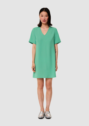 model wearing Ruban green crepe dress from Tara Jarmon Lebanon