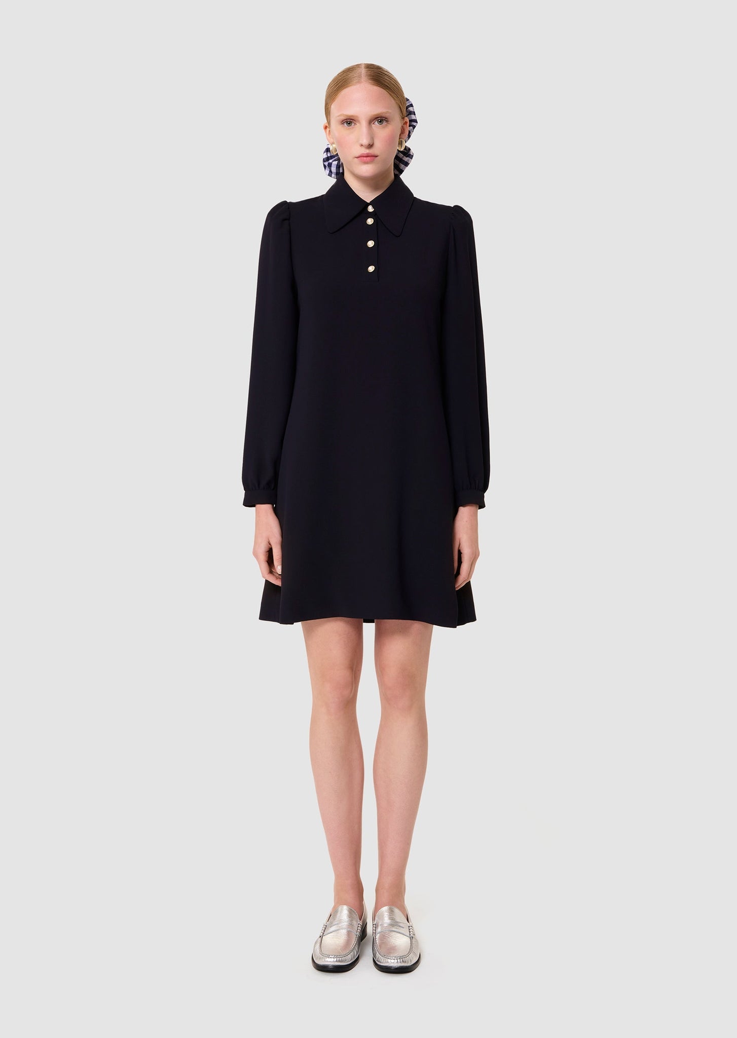 Woman wearing a Rolfo midnight blue crepe dress from Tara Jarmon Lebanon on a white background 