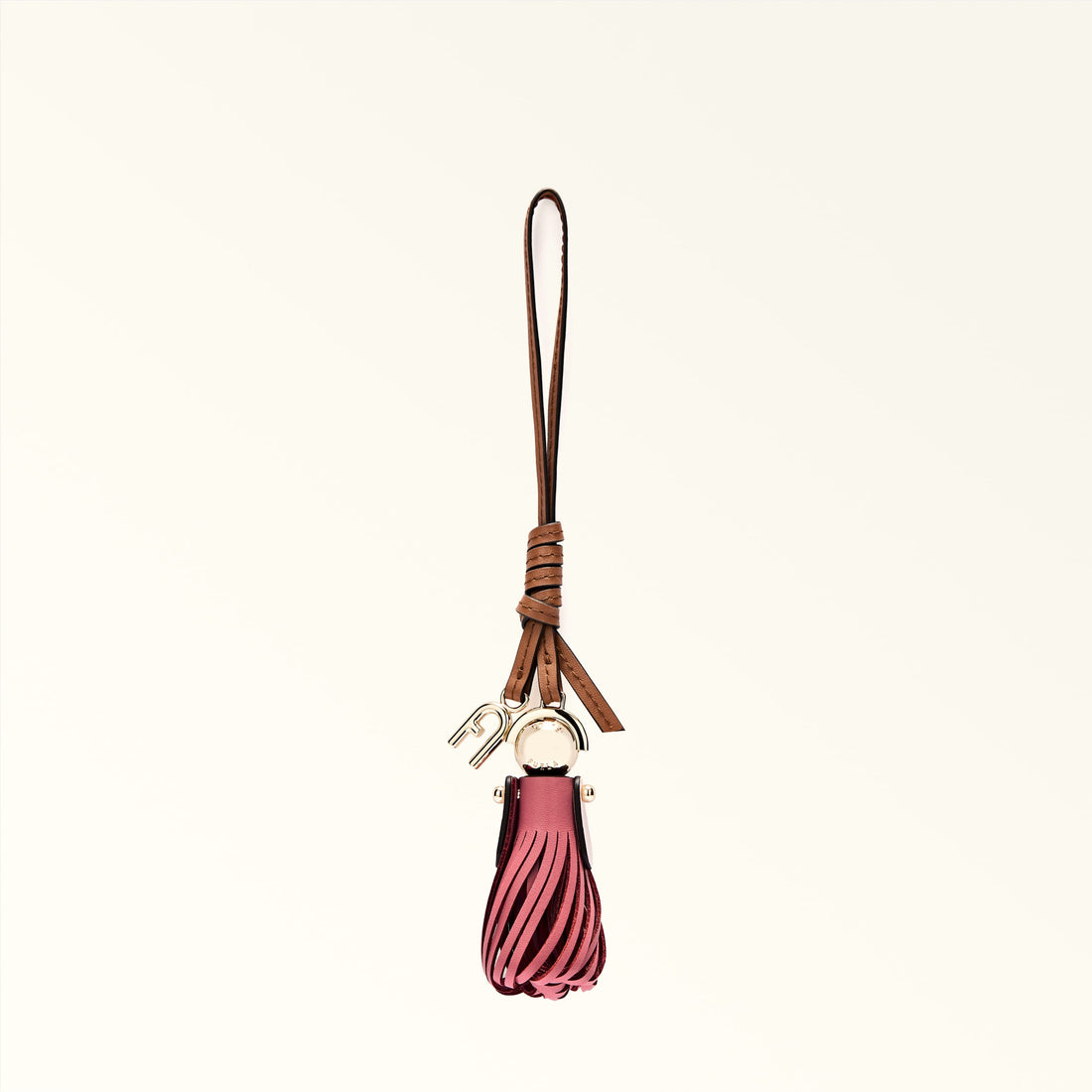 Pink tassel keychain with brown leather strap on a white background