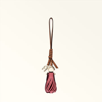 Pink tassel keychain with brown leather strap on a white background