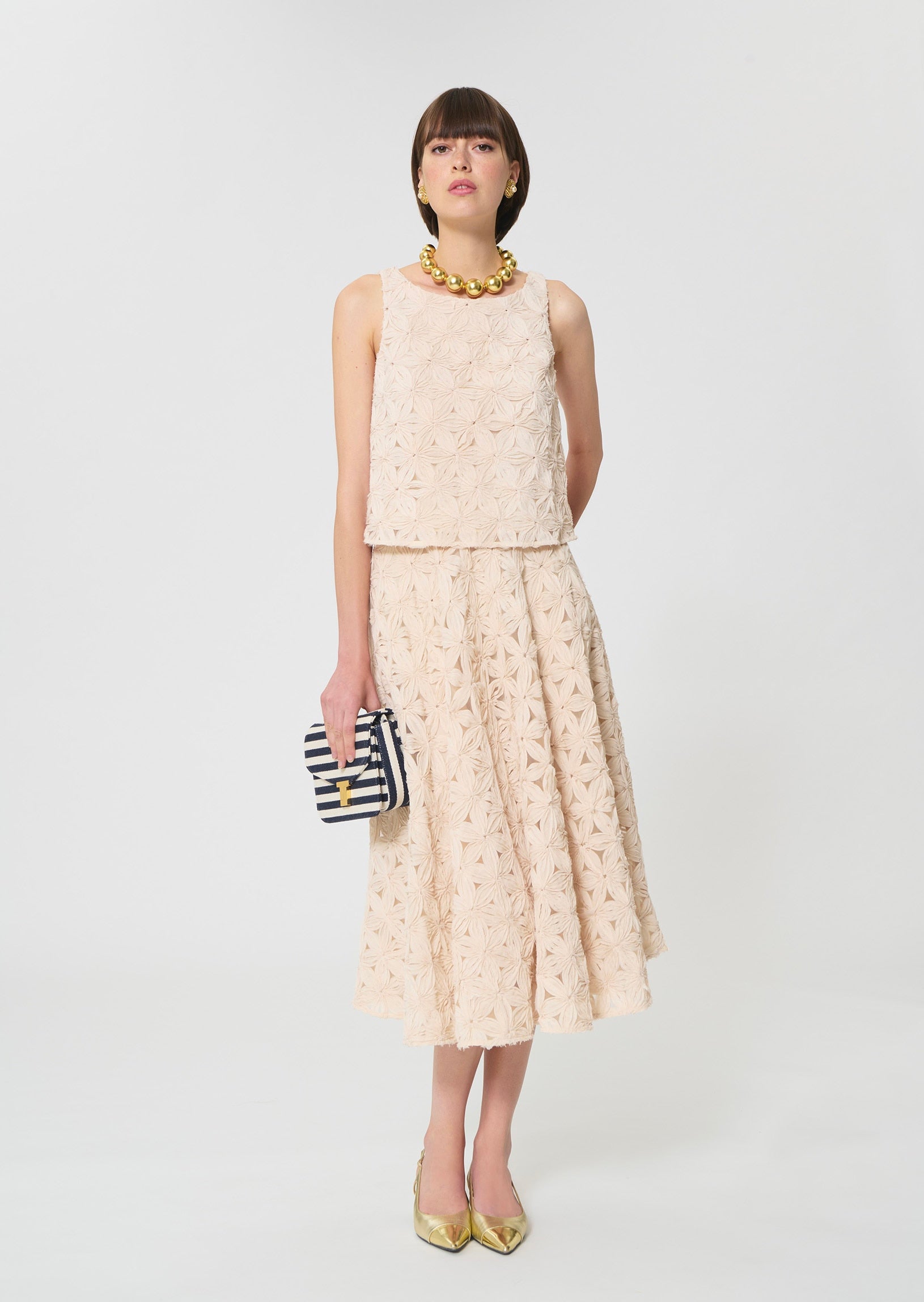 top in beige embossed floral pattern