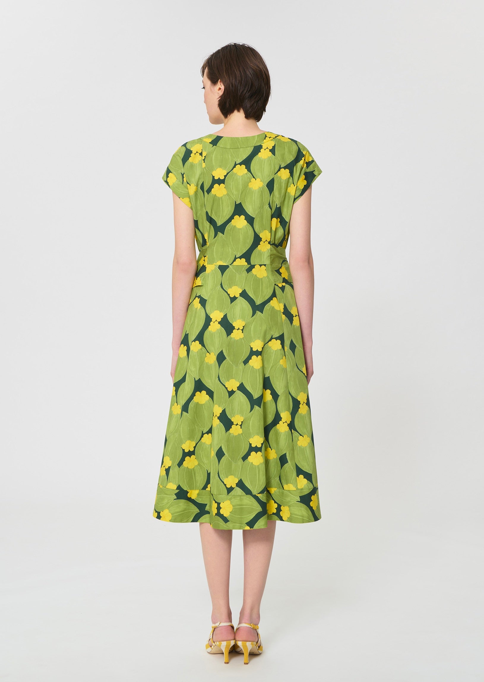dress in dark green floral print