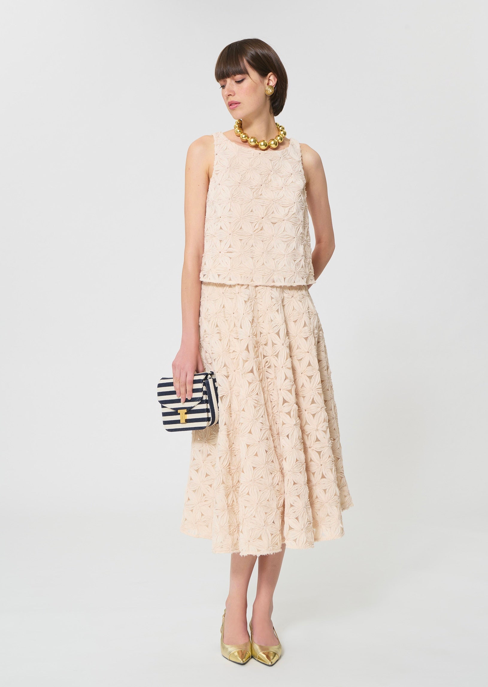 skirt in beige embossed floral pattern