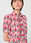 dress in pale pink retro print