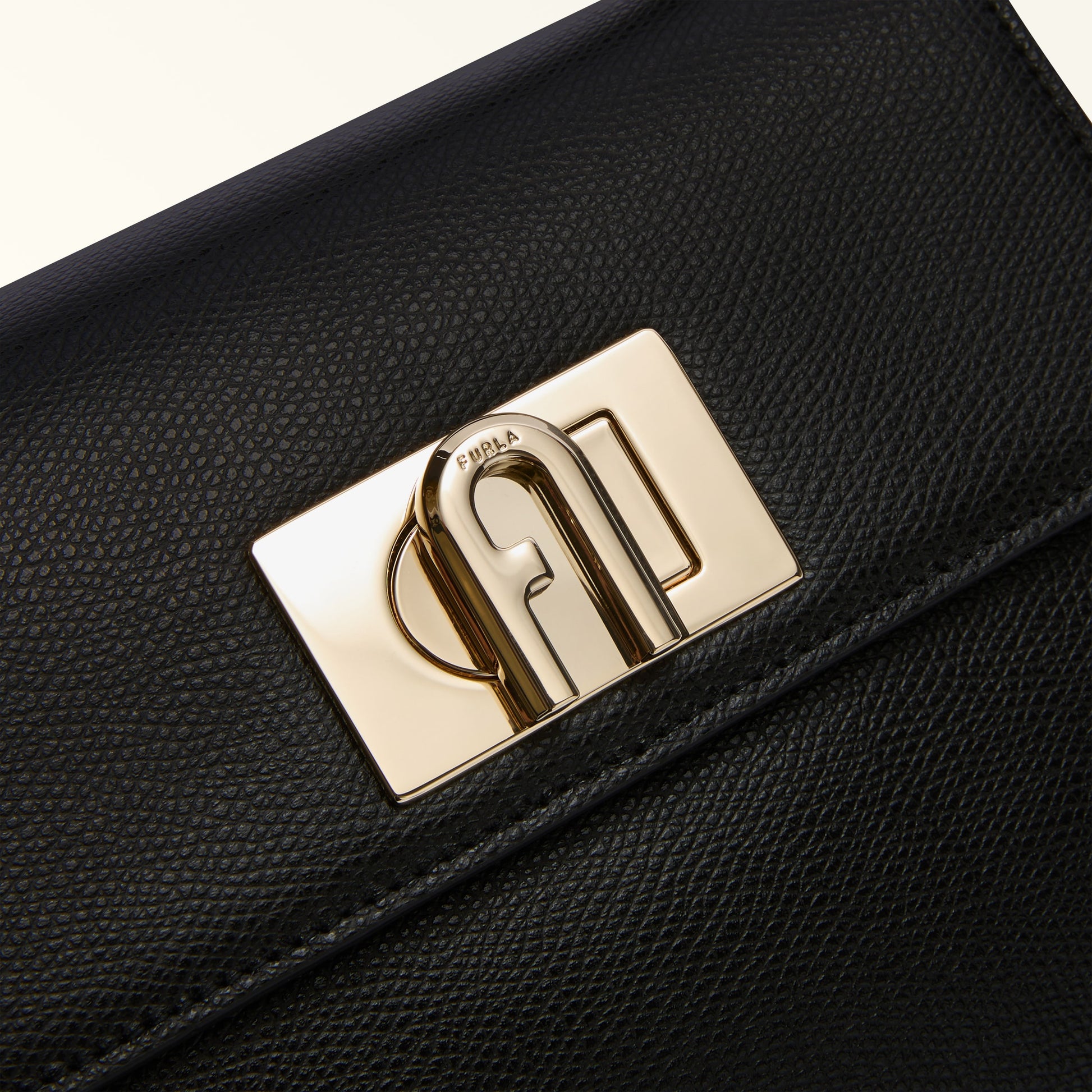 Furla 1927 Mini Top Handle Bag In Leather