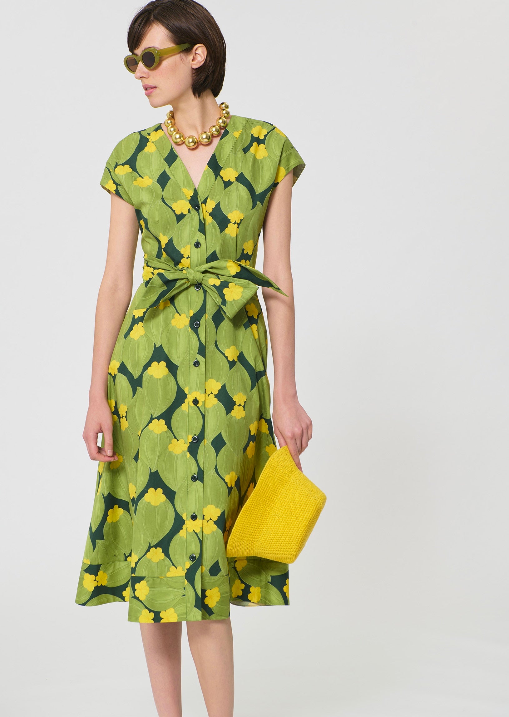 dress in dark green floral print