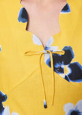 dress in yellow floral printed linen and cotton