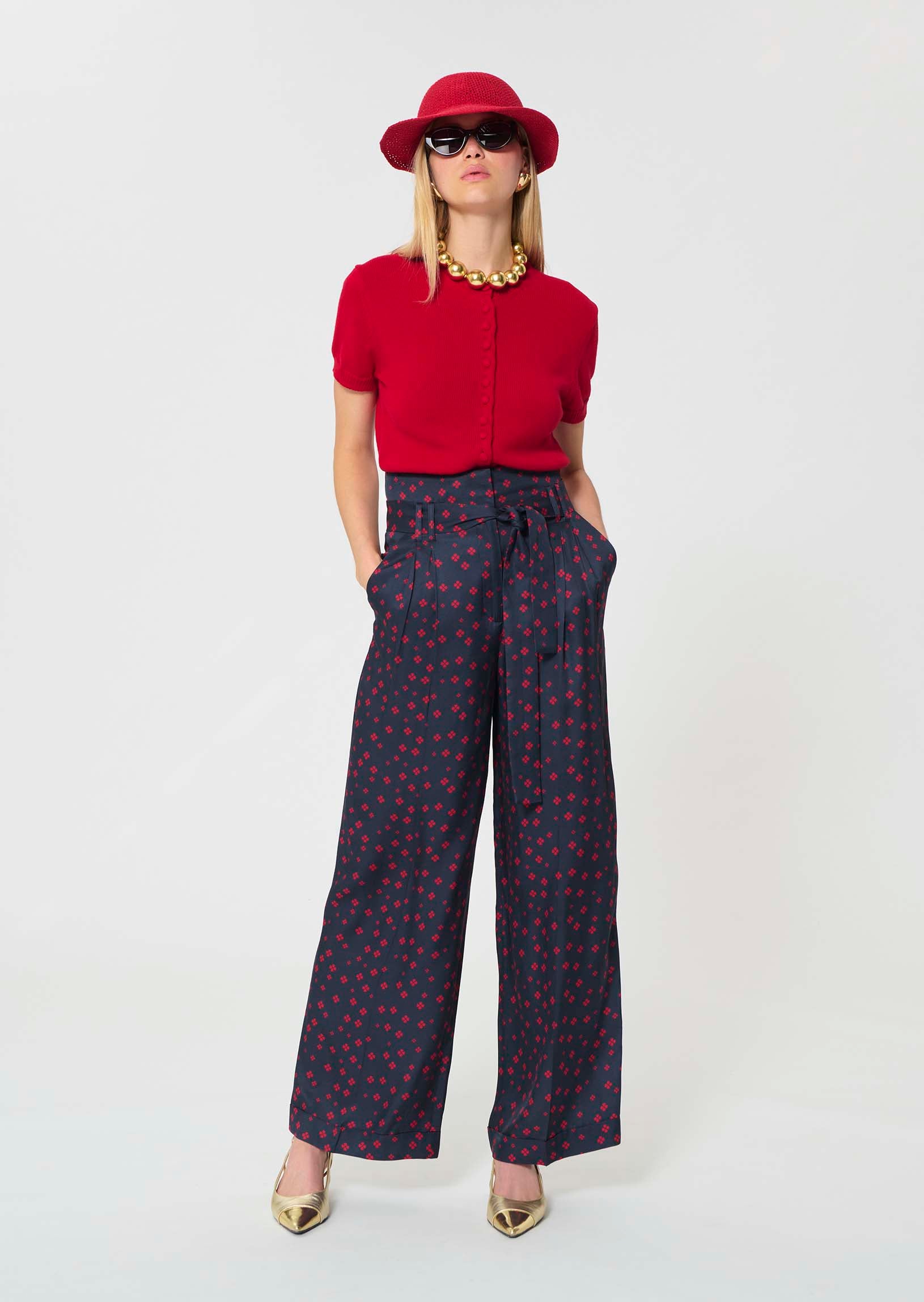 trousers in midnight blue with mini clover print