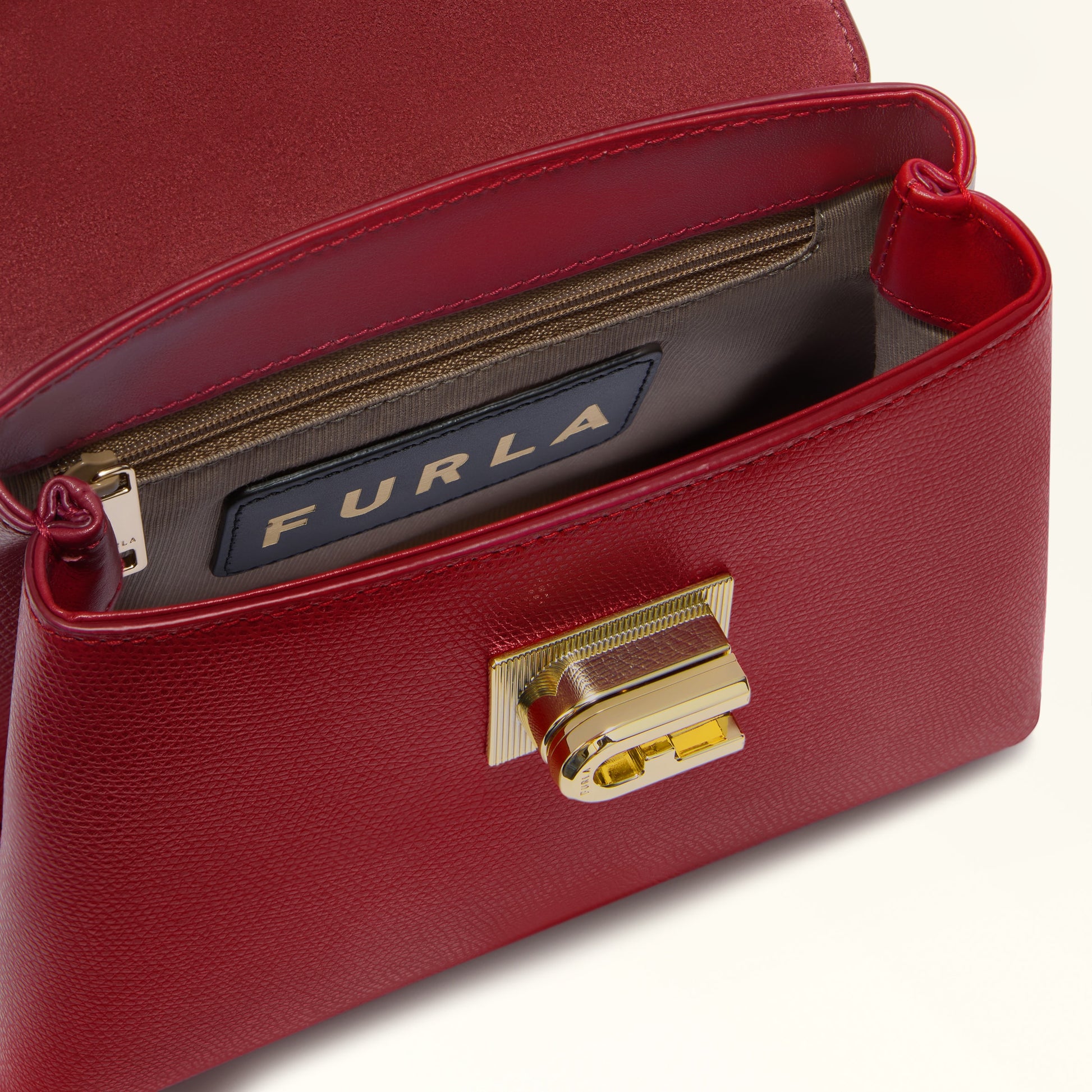 Furla 1927 Mini Top Handle Bag In Leather