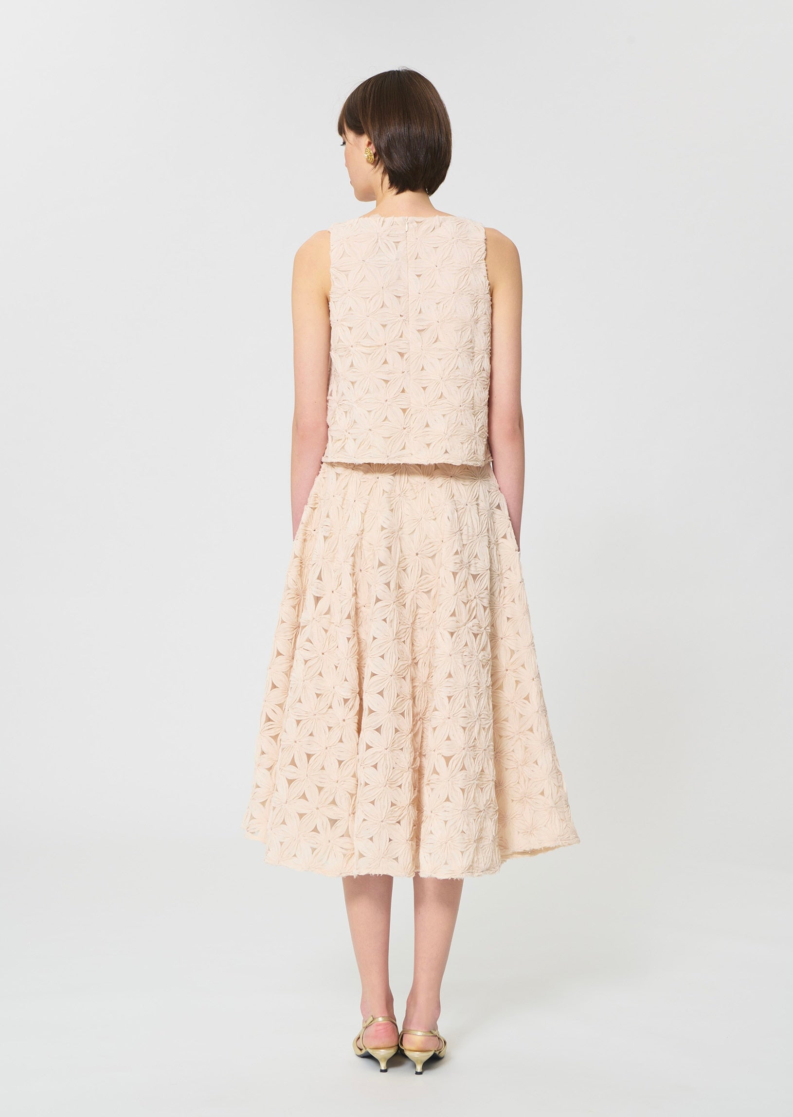 skirt in beige embossed floral pattern
