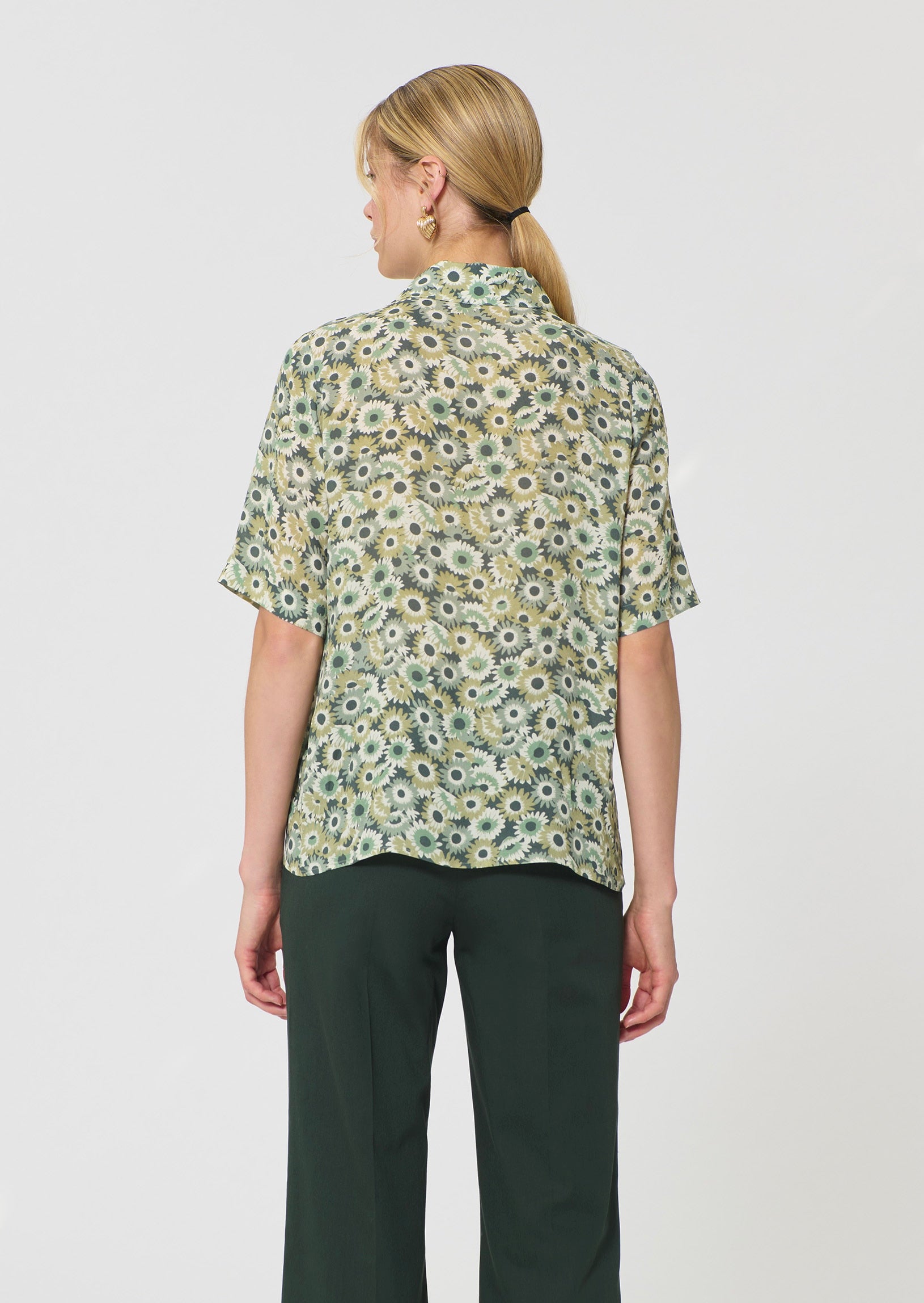 top in green floral print