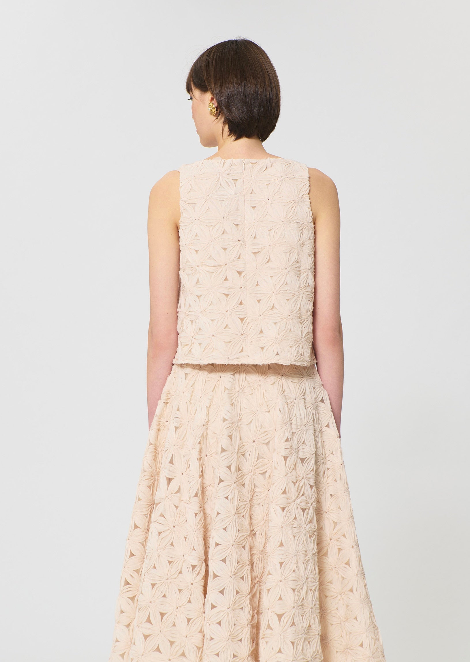 top in beige embossed floral pattern