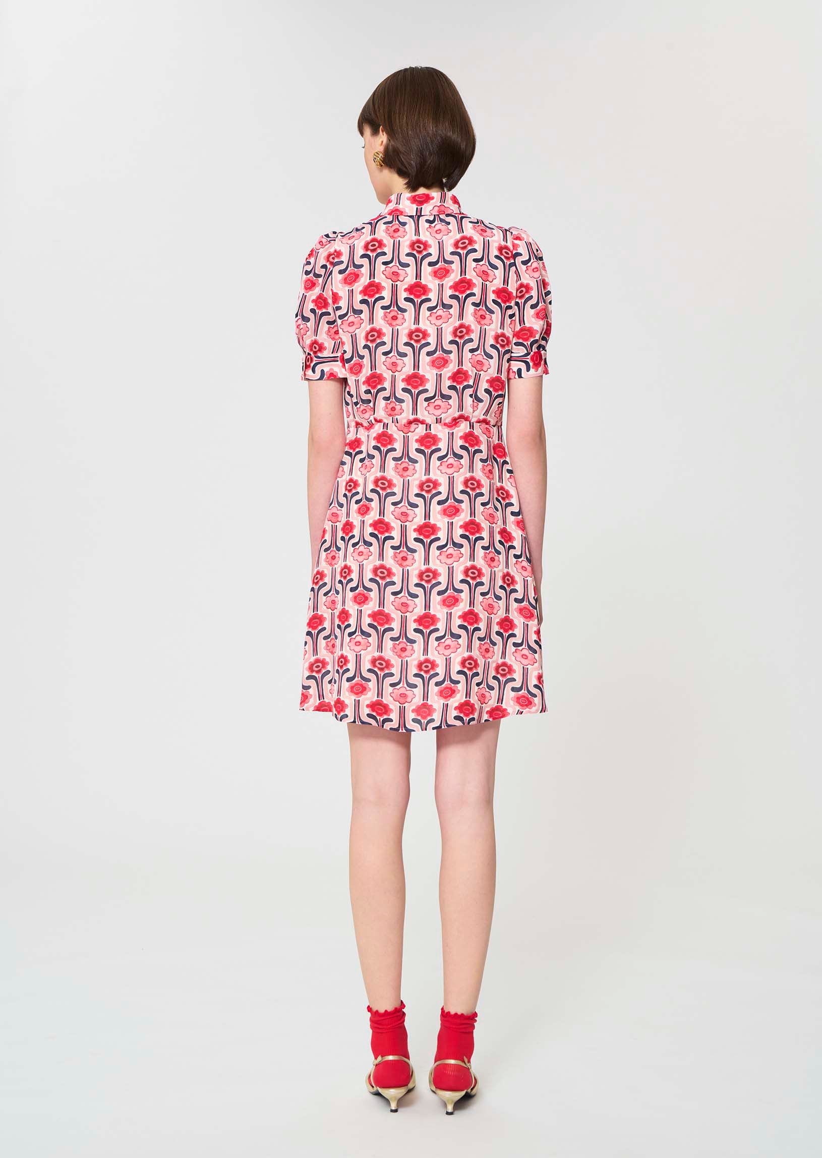 dress in pale pink retro print