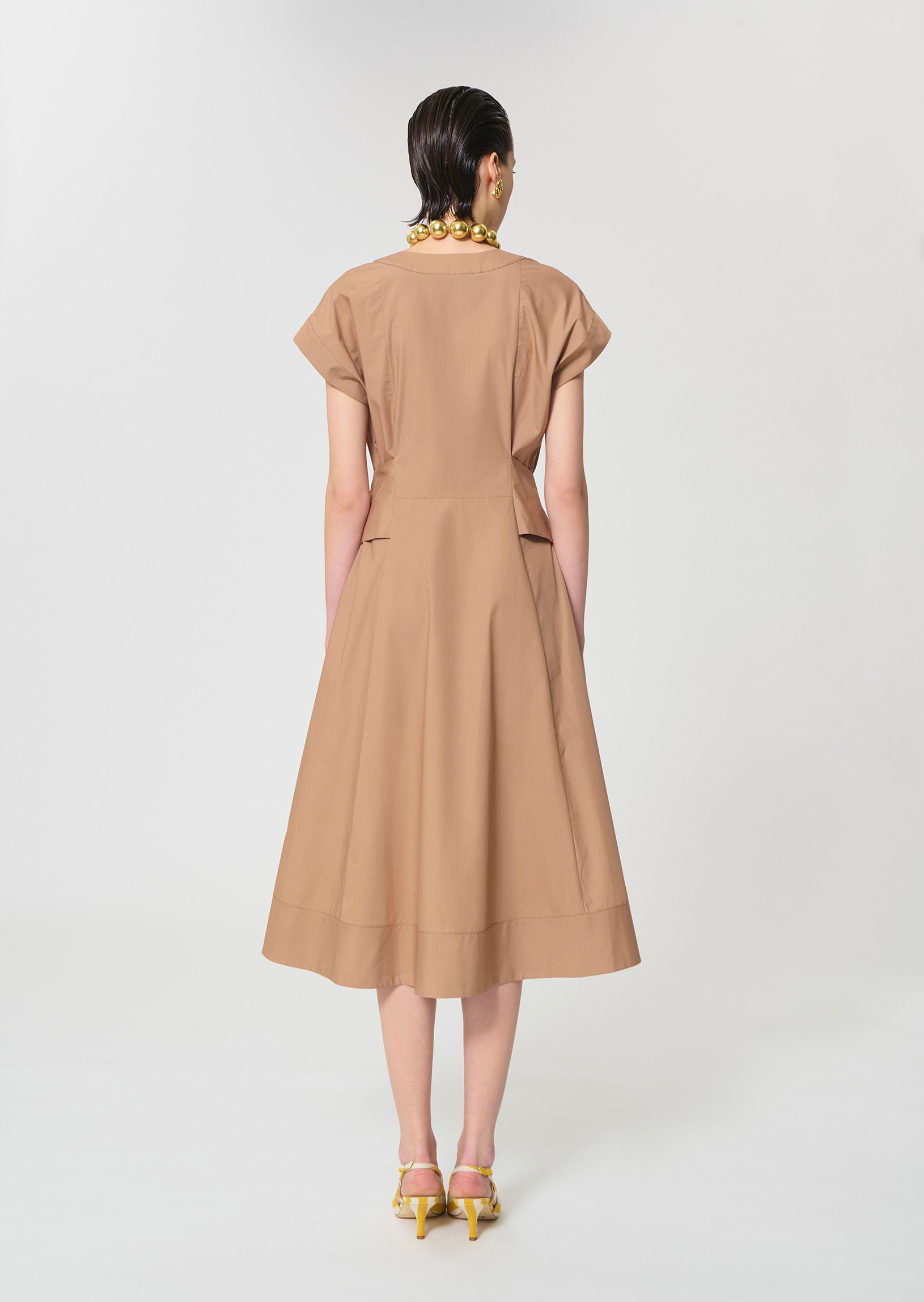 dress in beige poplin
